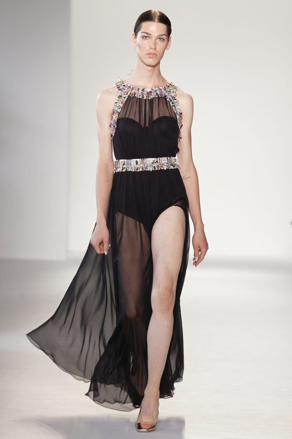 Transgender model Avie Acosta in Christian Siriano gown at runway show
