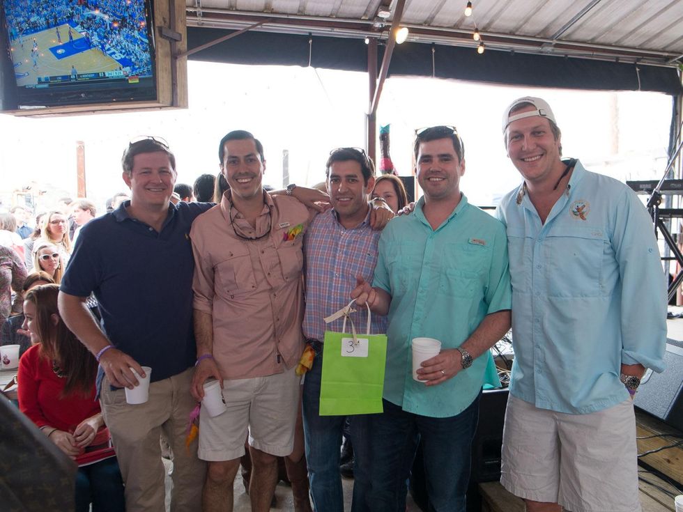 Travis Bourland, from left, Max Monzon, Michael Kruger, Ryan Mendez and Joel Gittemeier at the Casa de Esperanzas Young Professional Chili Cook-off February 2014