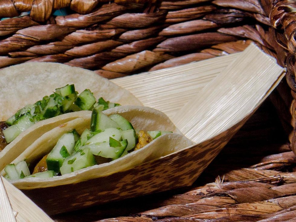 Trenza cumin scented corn tortillas with curried braised short ribs with a cucumber salas