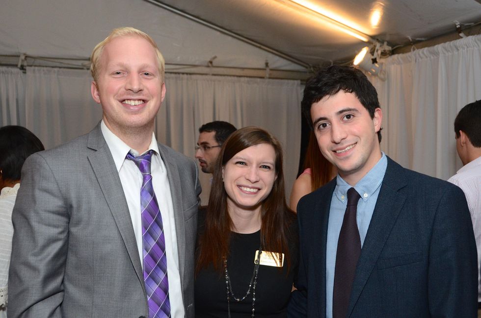 Trevor and Maria Sharon, from left, with Mark Wulfe at the Rienzi Punch Party October 2014
