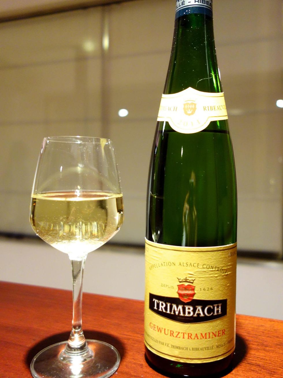 Trimbach Vineyards\u2019 Gewurztraminer bottle of wine with glass of wine