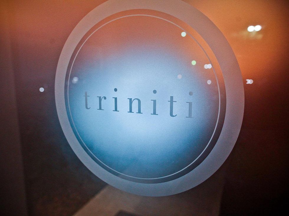Triniti restaurant, sign