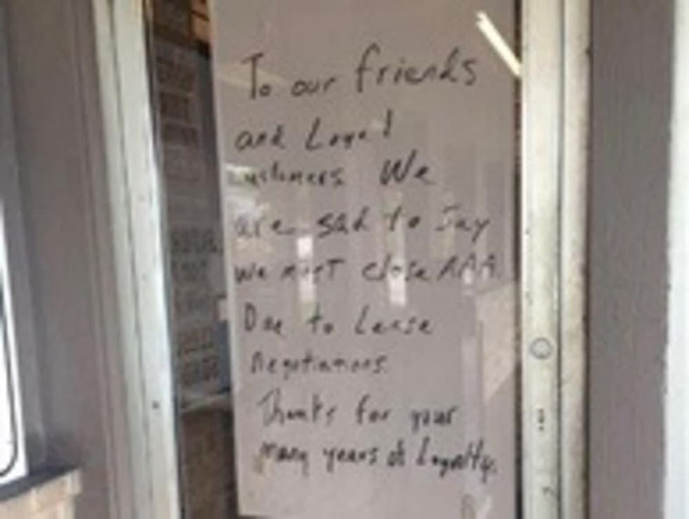 Triple A closing posted on door