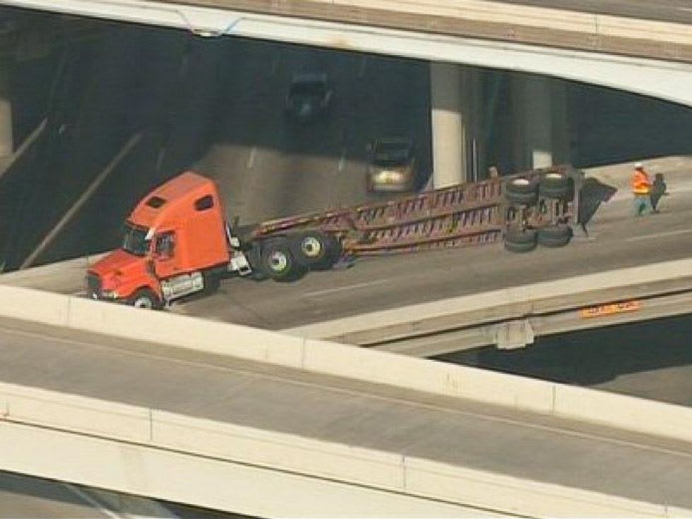 truck overturned at 59 and Loop 610 Houston June 2013