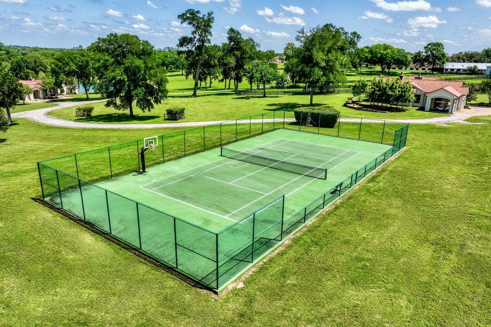 Try your hand at tennis at the resort's full-size court.