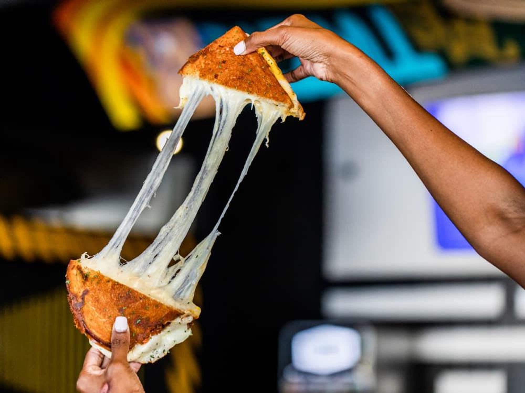 Twisted Grilled Cheese sandwich pull