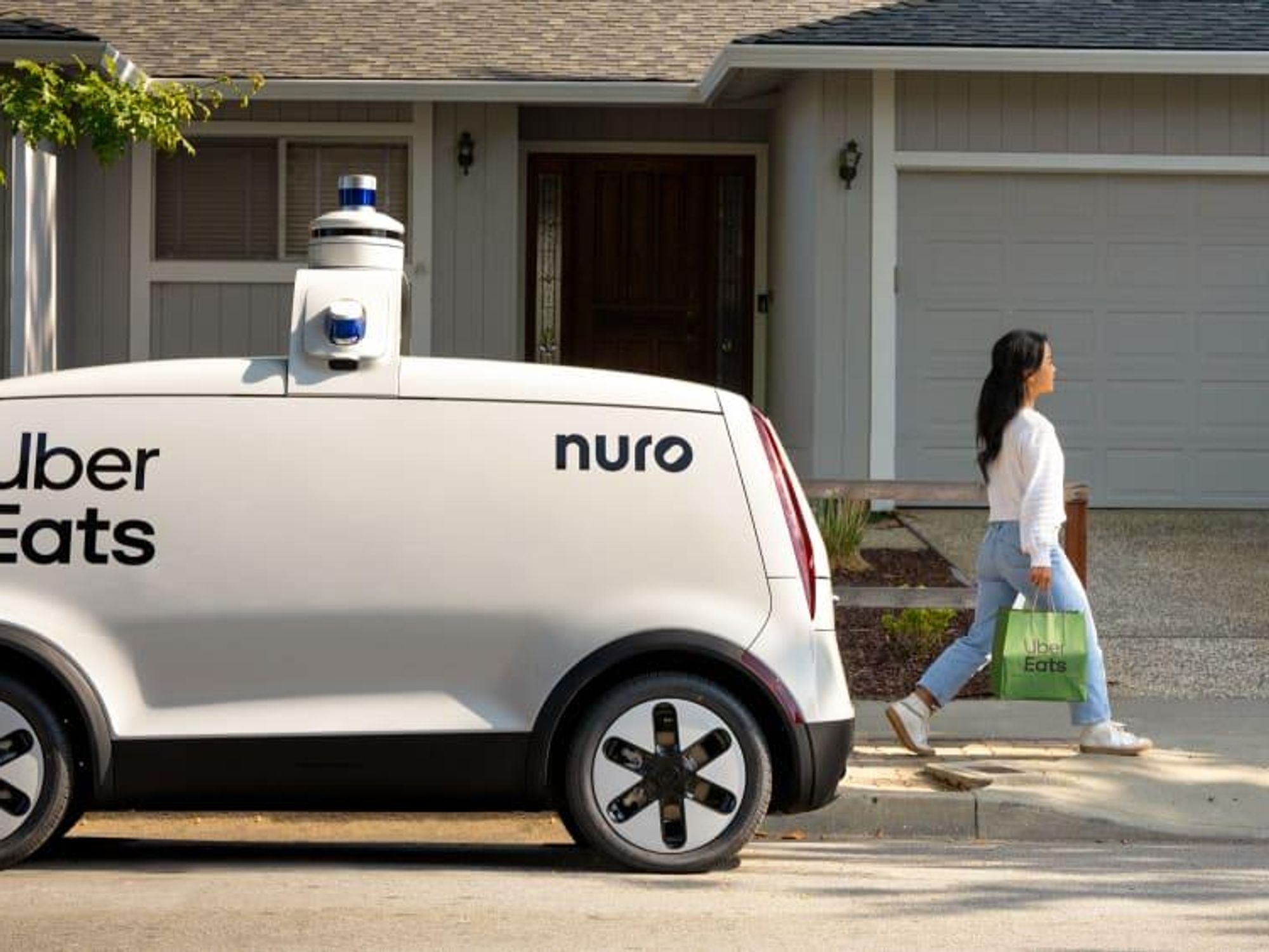 Uber Nuro automated delivery car vehicle