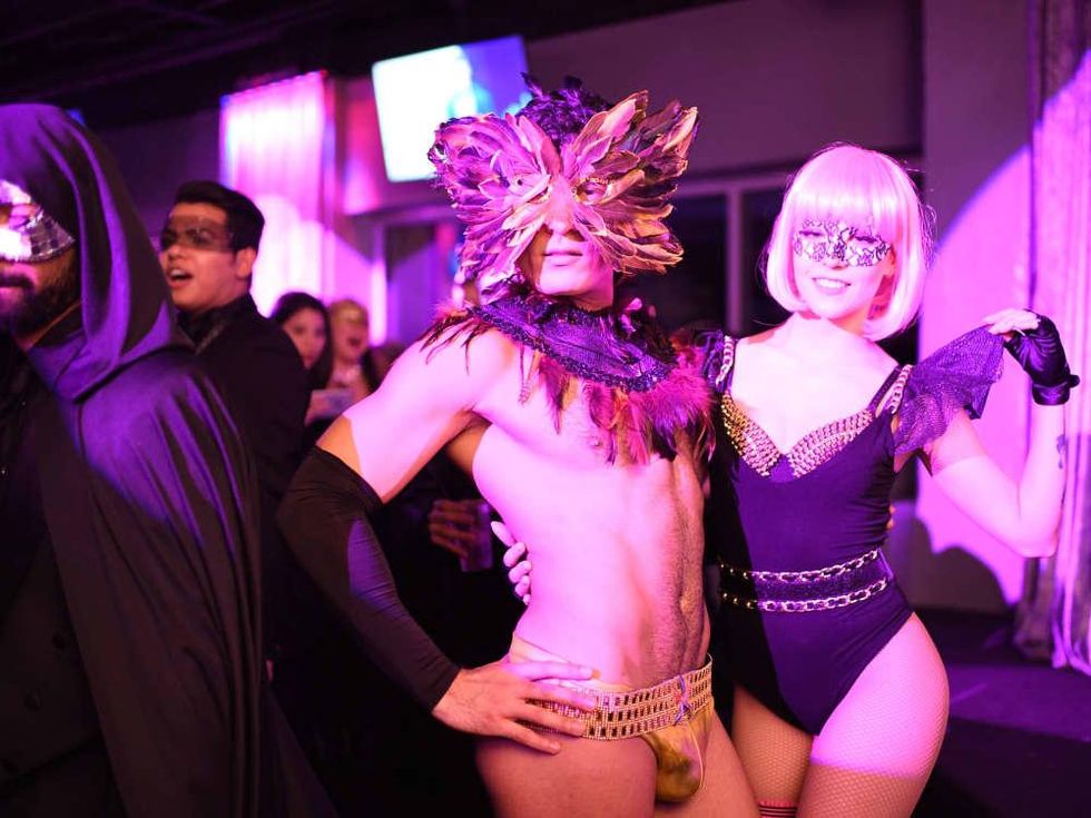 Unidentified couple at Heart of Fashion Masquerade Ball