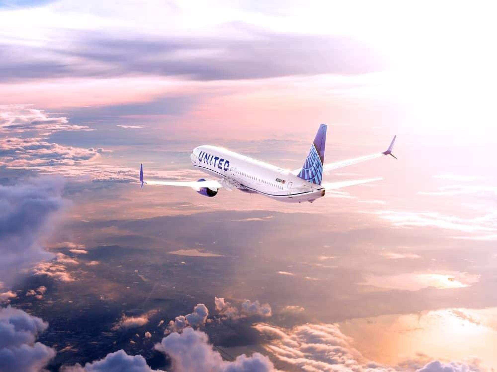 United Airlines jet clouds