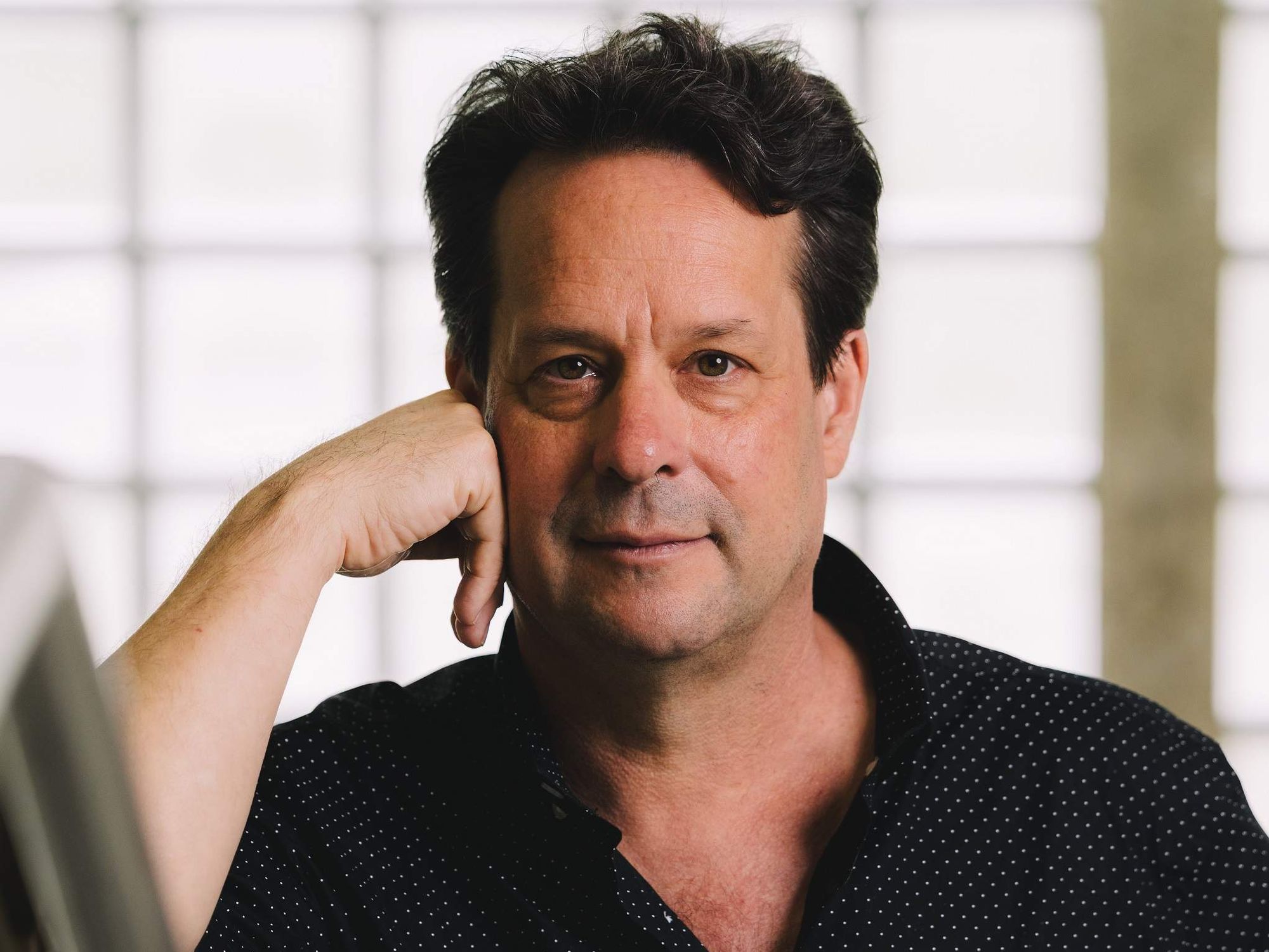 University of Houston professor and 2026 Texas State Poet Laureate Kevin Prufer looks into the camera.