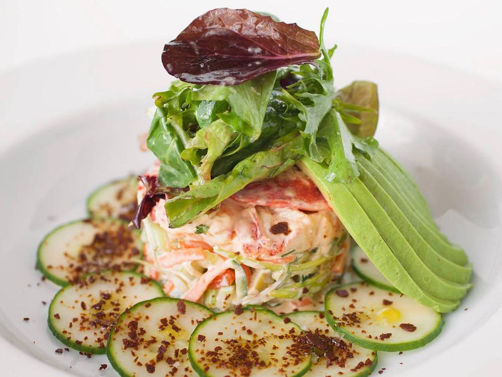 Up Restaurant Lobster salad fresh atlantic poached lobster, pickeled cucumbers and carrots, sun dried tomatoes, preen olives, baby filled greens with dried miso flakes