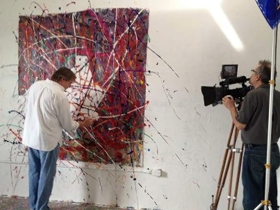 Van McFarland artist painting and being photographed December 2012