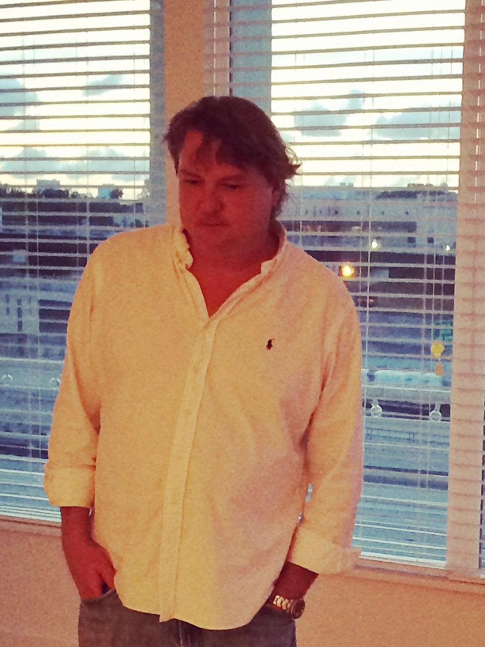 Van McFarland Houston artist December 2014 in front of window