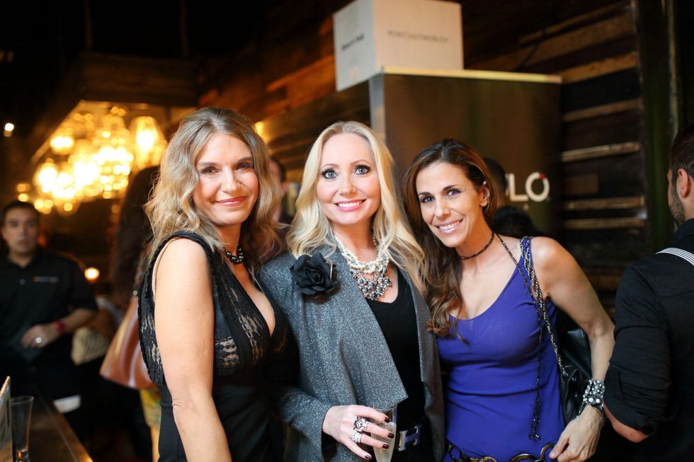 Vanessa Gerth, from left, Lori Geshay and Lina Mctar at Ruggles Black Grand Opening October 2014