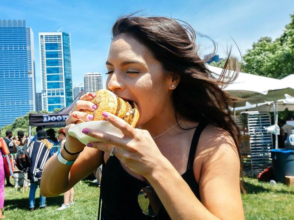 Vegandale Festival girl eating burger