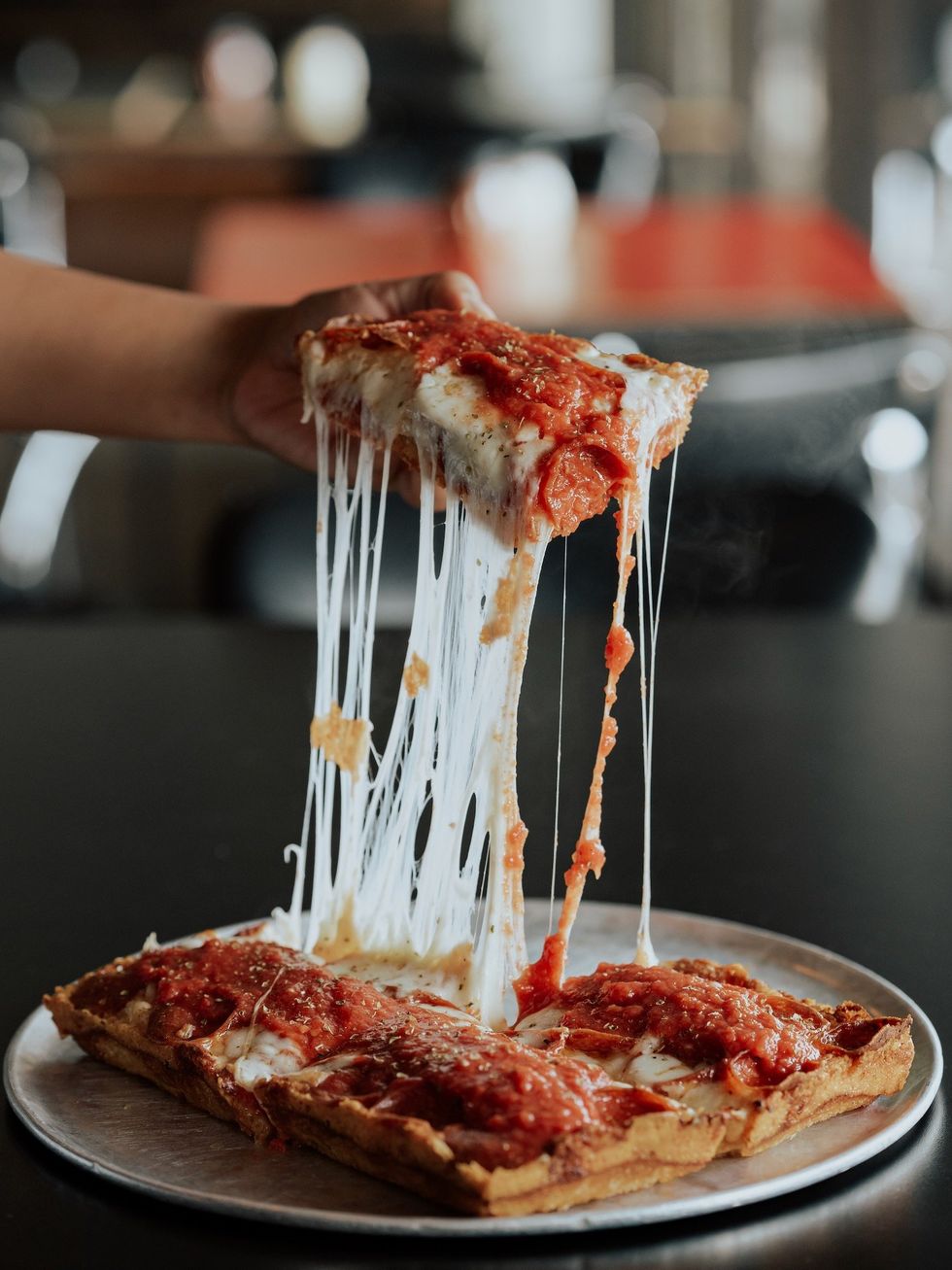 Via 313 restaurant pizza cheese pull