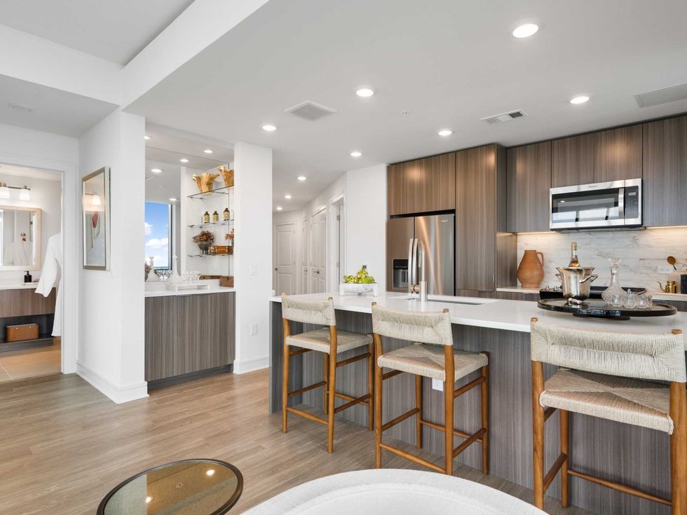 View of kitchen and wet bar in a two-bedroom unit at Hanover Buffalo Bayou