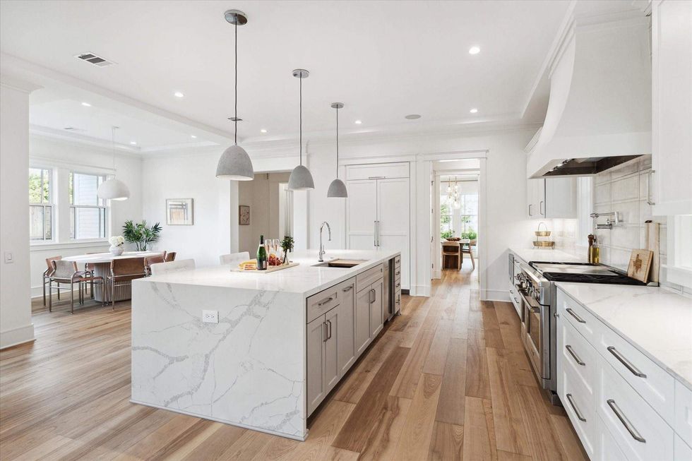 View of kitchen at 1039 Harvard Street, looking toward the dining room