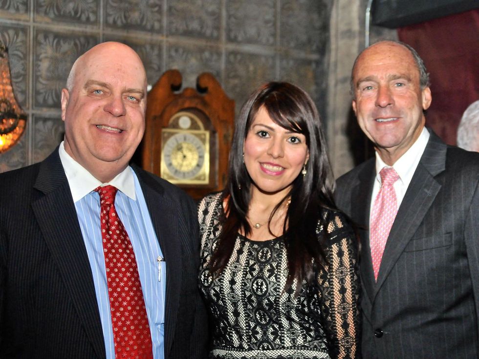 Wayne Klotz, from left, Morena Arredondo and Eric Andell at the Mayor's Hispanic Advisory Board Holiday Party December 2013