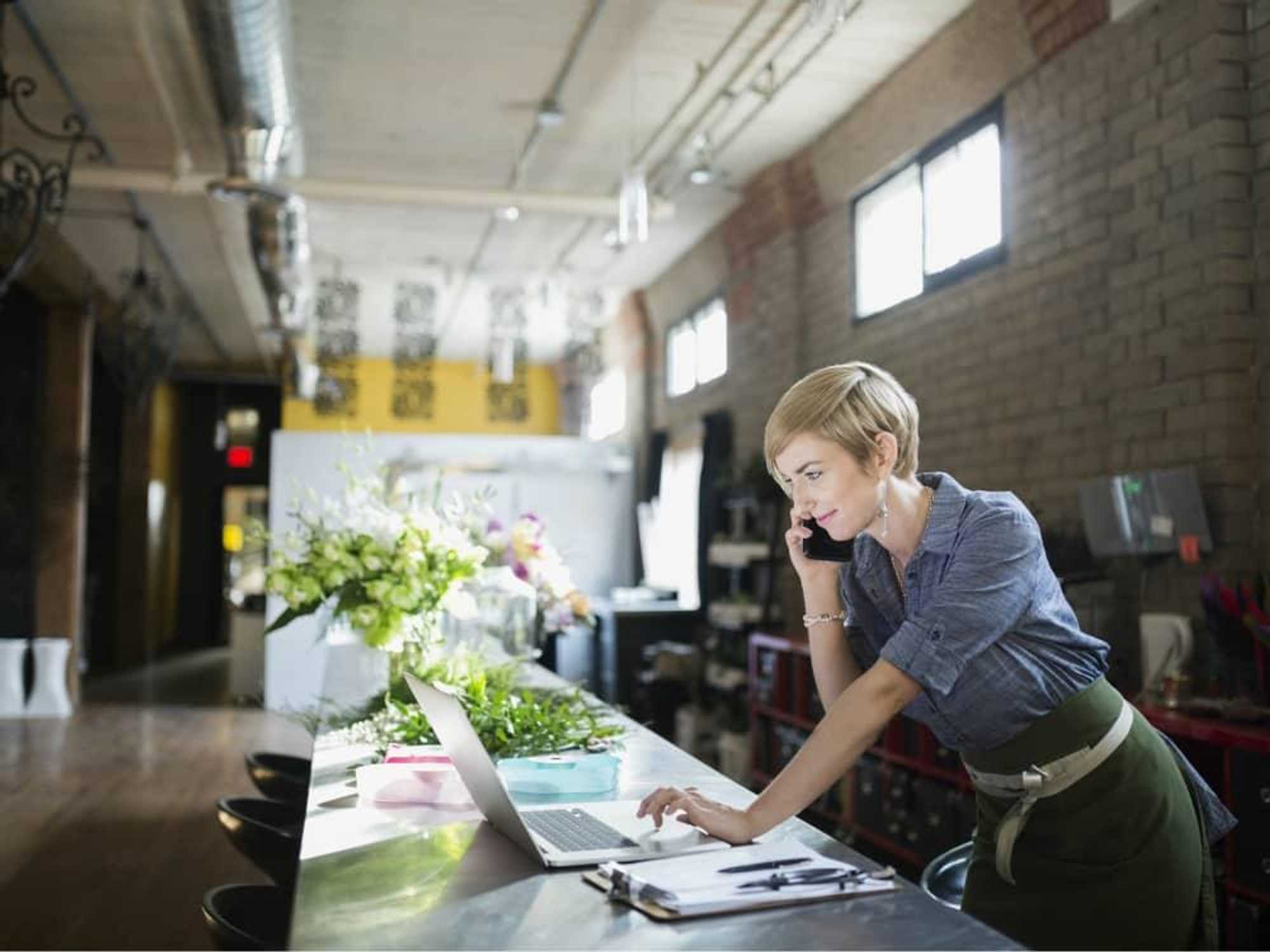 Woman looking at her laptop computer