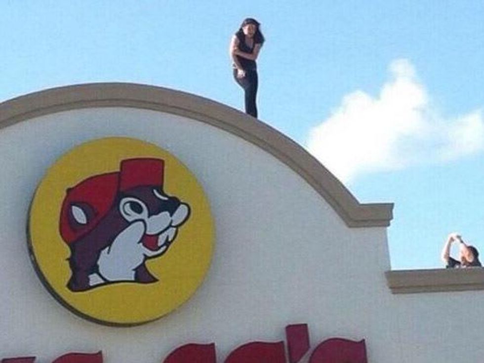 woman on Buc-ee's roof 2 June 2013