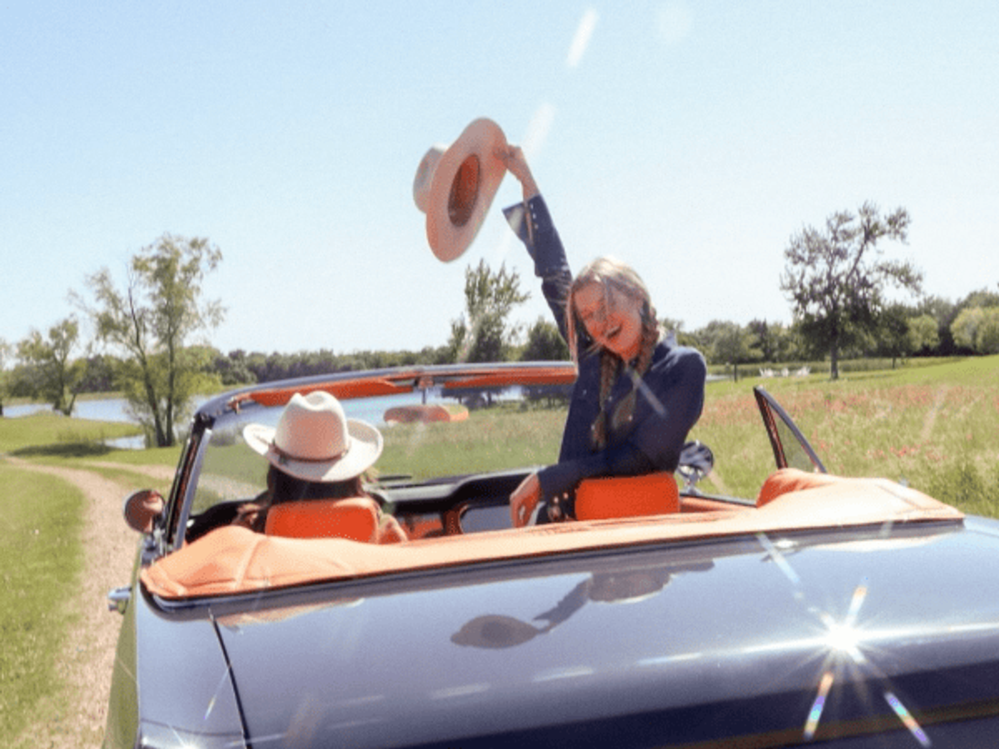 women in convertible