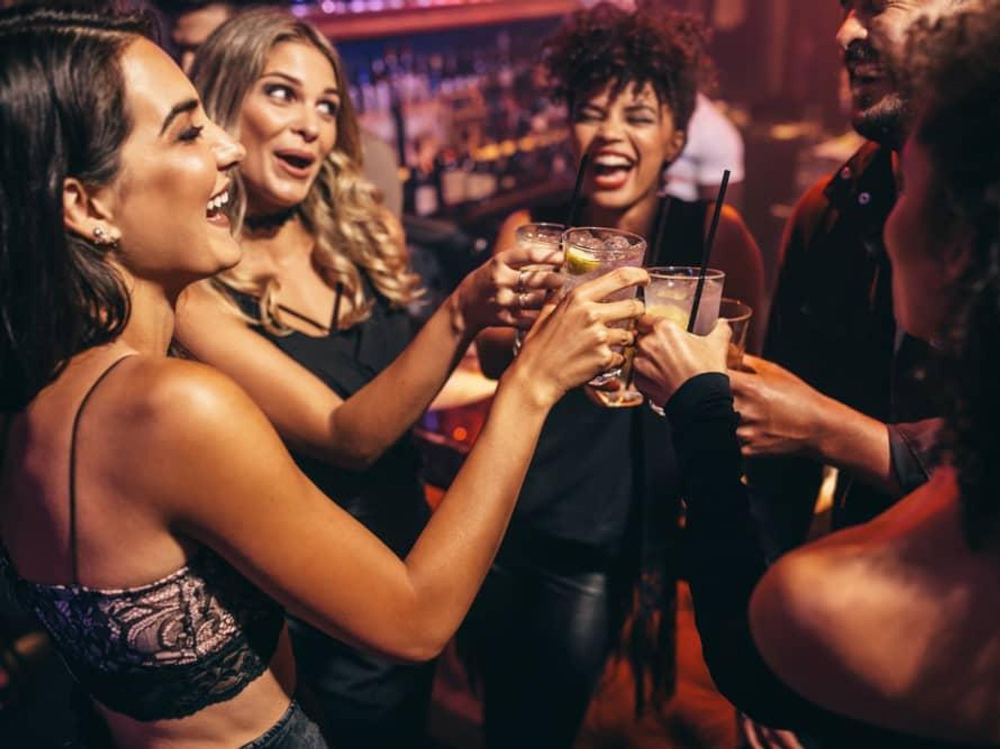 Women toasting in bar
