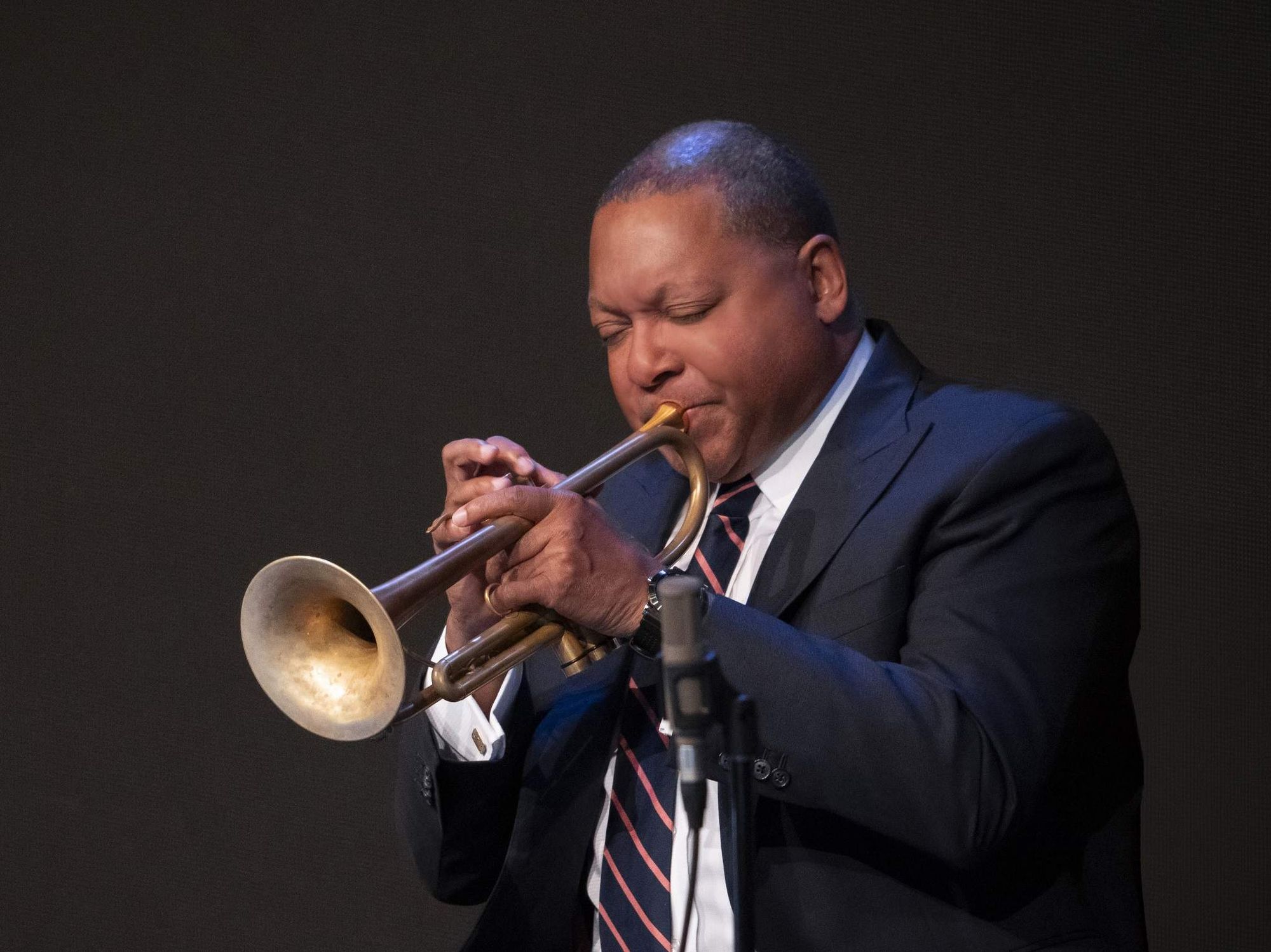 Wynton Marsalis plays a trumpet on stage