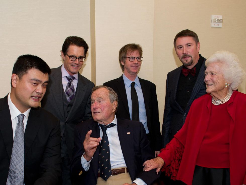 Yao Ming, from left, Kyle MacLachlan, President George H.W. Bush, Dana Carvey, Eric Dunham and Barbara Bush at the George Bush Presidential Library Foundation dinner December 2013