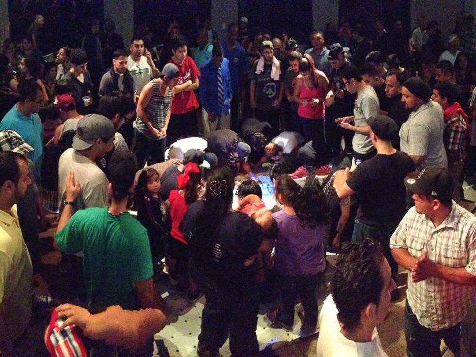 Youth Advocates Inc. Nat the breakdancer crowd signing floor August 2013