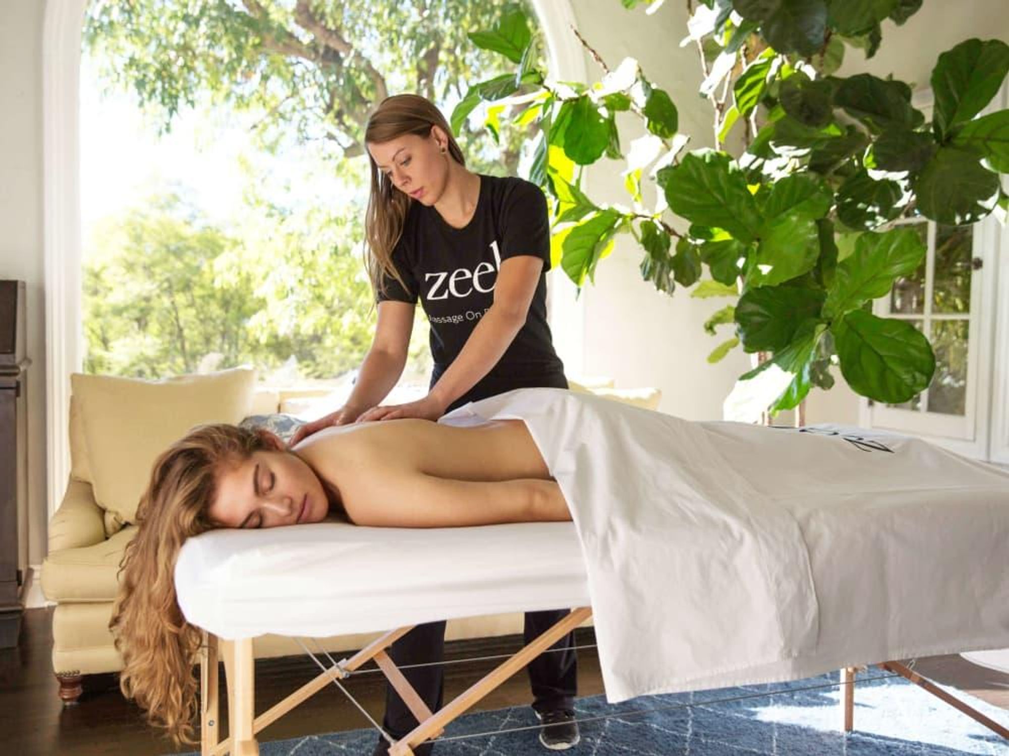 Zeel massage on demand app therapist in home